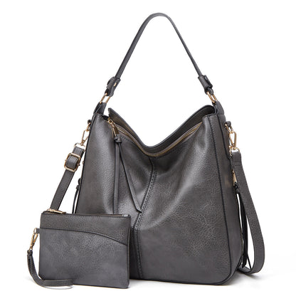 Klassische Lederschultertasche mit eleganten Golddetails