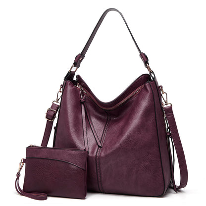 Klassische Lederschultertasche mit eleganten Golddetails