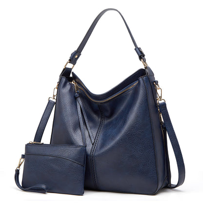 Klassische Lederschultertasche mit eleganten Golddetails