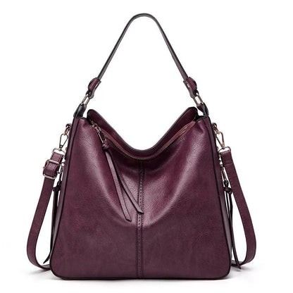 Klassische Lederschultertasche mit eleganten Golddetails